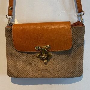 Leather Italiano textured small crossbody bag with swing clasp